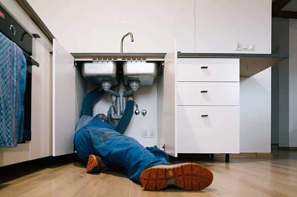 Professional Emergency Plumber technician working in Amherst, NH